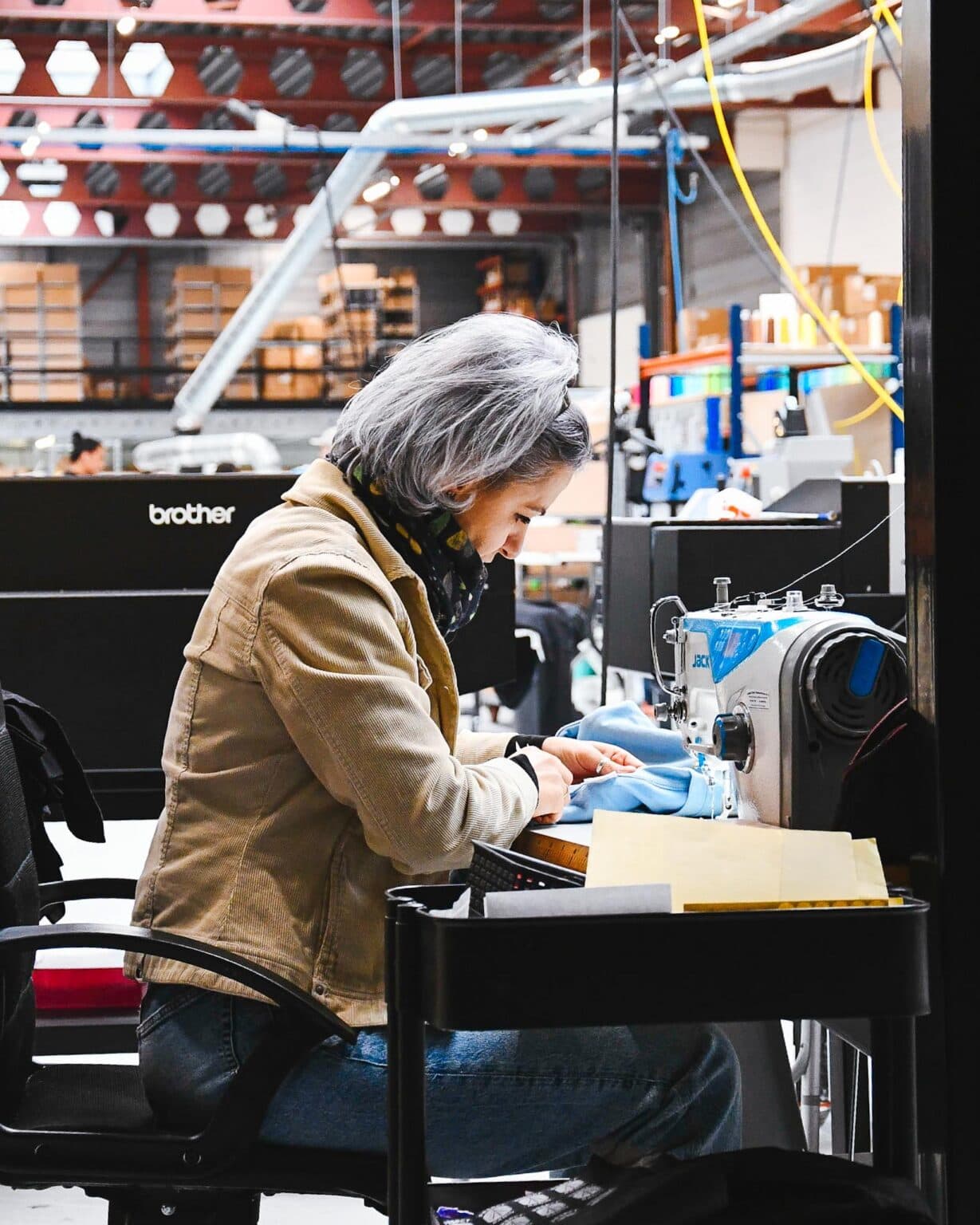 A colleague at the sewing machine